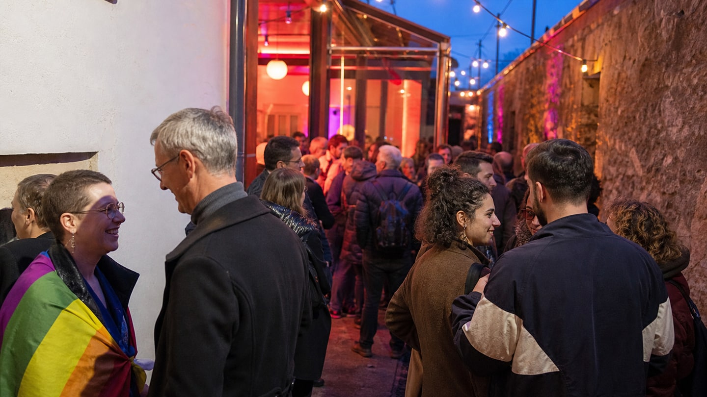 AI-generated editorial scene for QUEER-Streifen Film Festival Regensburg 2026; not a photograph of the event