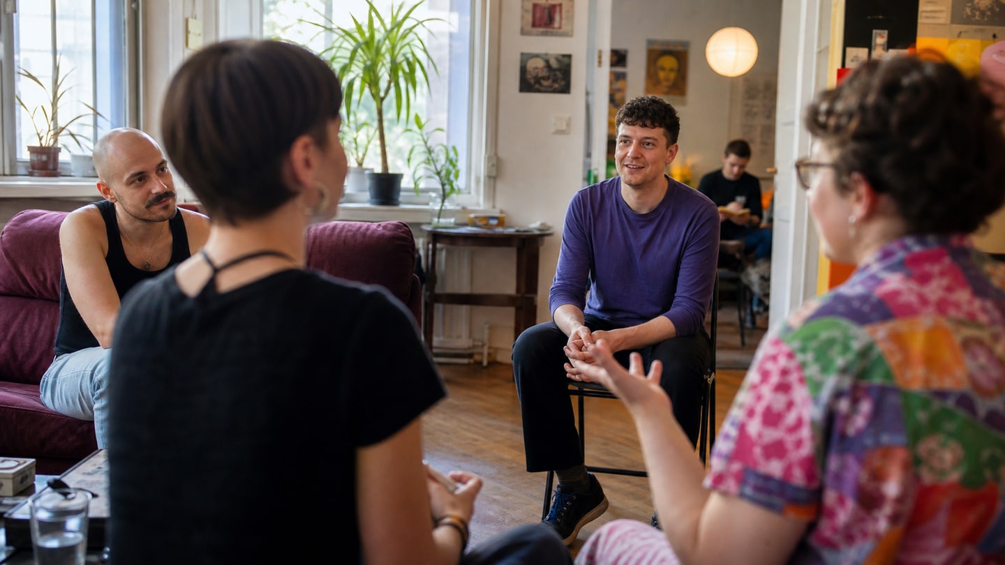 AI-generated editorial scene for Queer advice at Queeres Zentrum Erlangen; not a photograph of the event