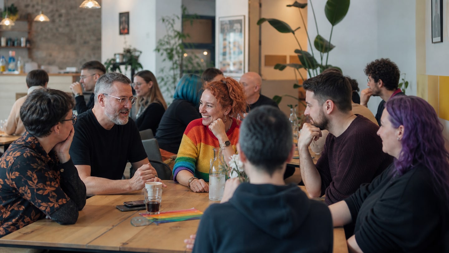 AI-generated editorial scene for Queer round table in Straubing; not a photograph of the event